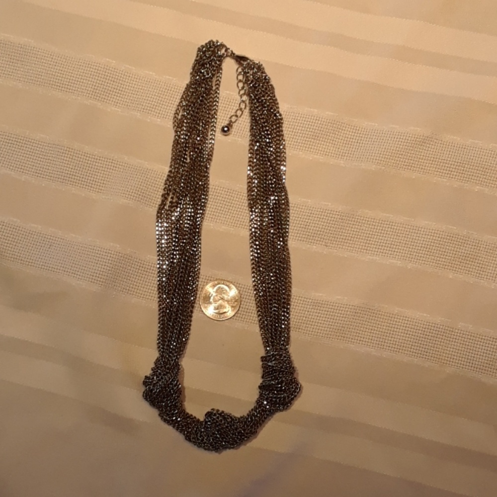 Vintage multi-strand silver tone knot necklace.